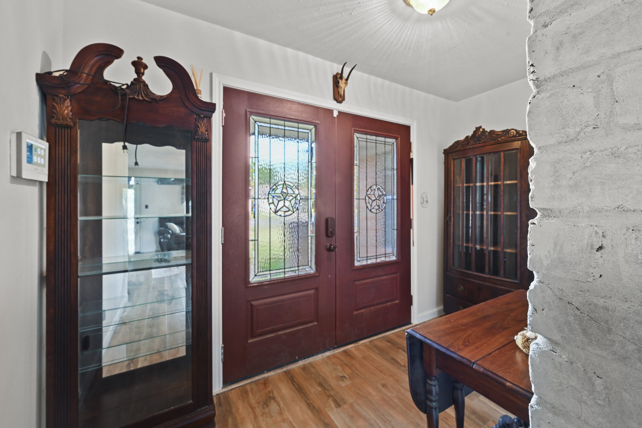 13823 Wickersham Lane Houston, TX 77077 - Photo 6 of 24 a view of front door