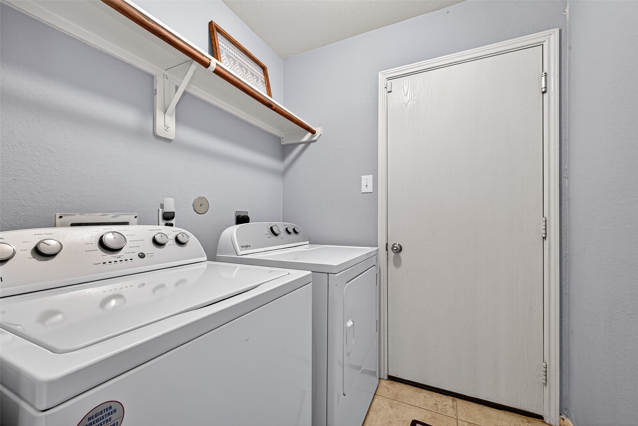 919 Wild Cotton Road Rosenberg, TX 77471 - Photo 12 of 20 a utility room with dryer and washer