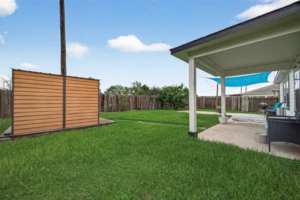 a view of a porch with a backyard