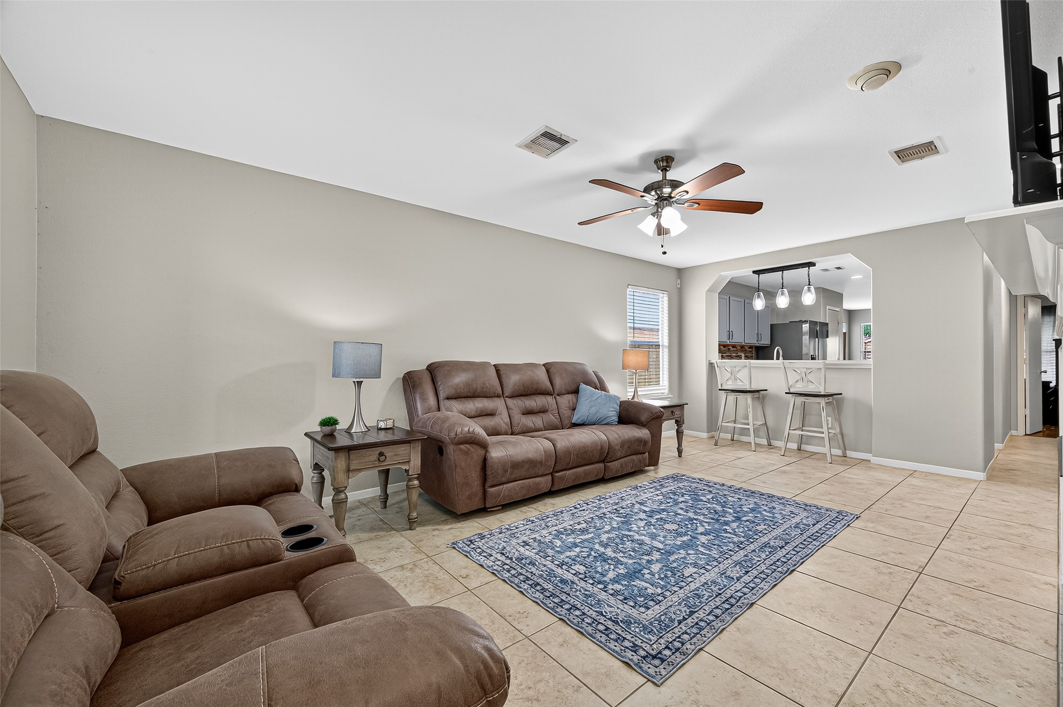 919 Wild Cotton Road Rosenberg, TX 77471 - Photo 3 of 20 a living room with furniture and wooden floor