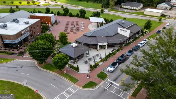 an aerial view of a house with a garden