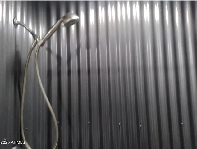 a bedroom with a bed and cabinets