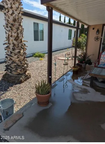 a view of a hallway with seating area