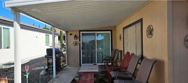 a view of a house with a flower garden