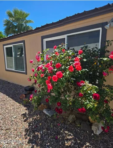 a room with dining table and chairs