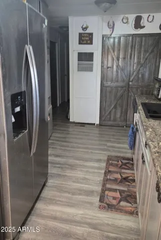 a stove top oven sitting inside of a kitchen
