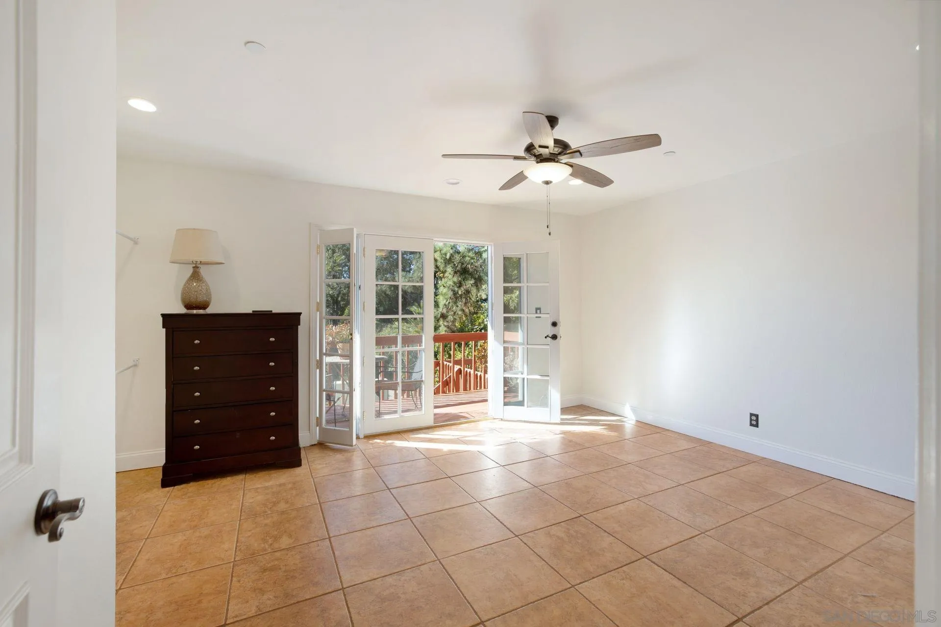 7671 La Brisa Rancho Santa Fe, CA 92067 - Photo 15 of 34 a view of an empty room with a window
