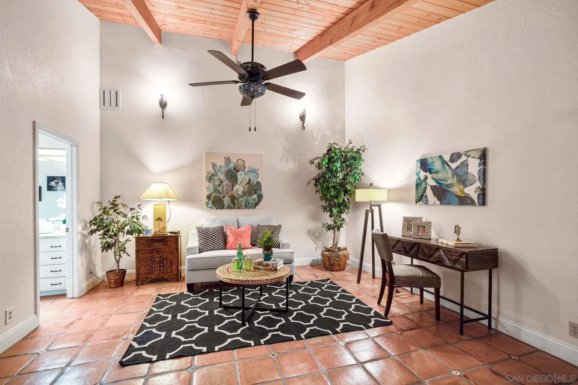 7671 La Brisa Rancho Santa Fe, CA 92067 - Photo 17 of 34 a living room with furniture and a rug