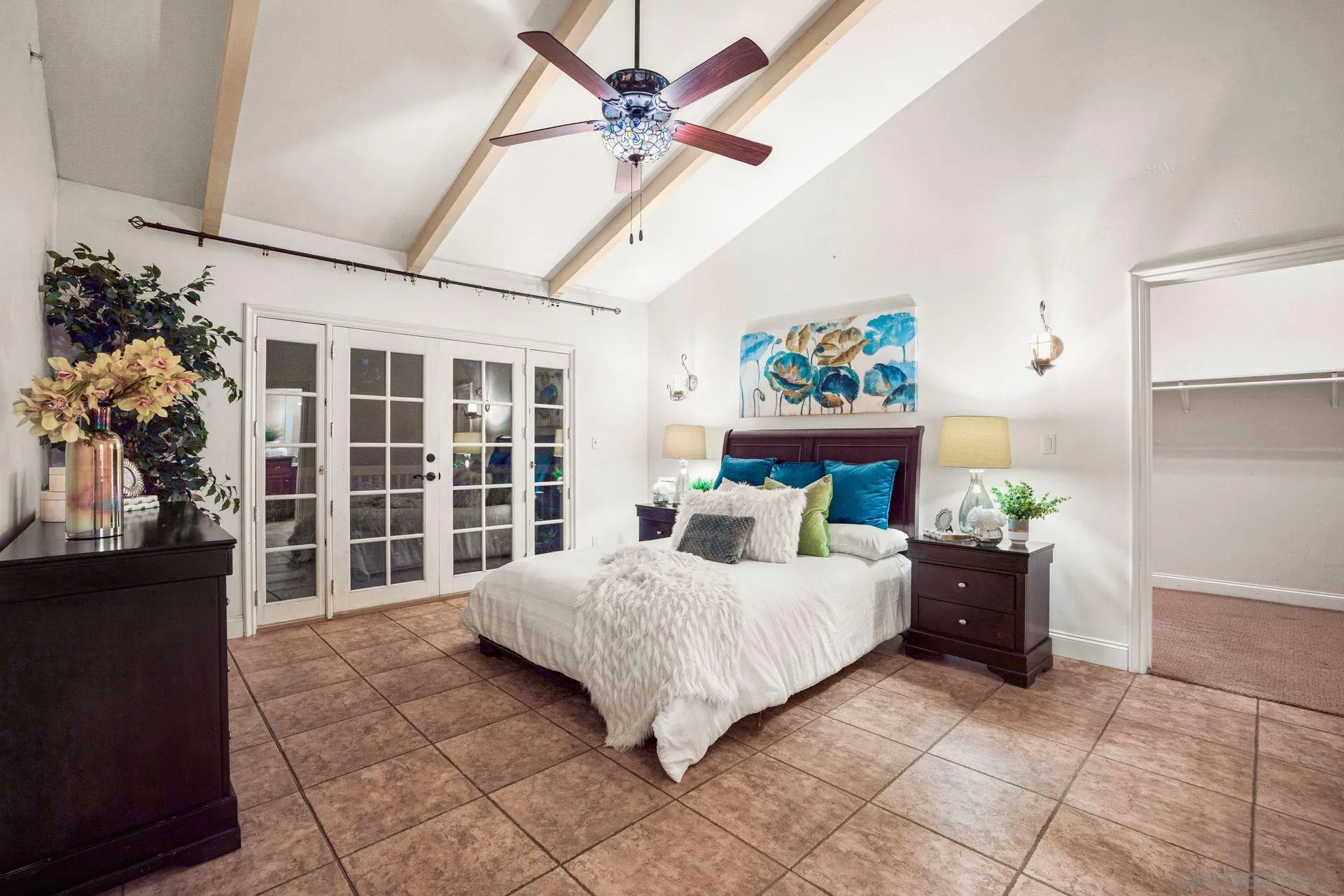 7671 La Brisa Rancho Santa Fe, CA 92067 - Photo 24 of 34 a bedroom with a bed and a large window