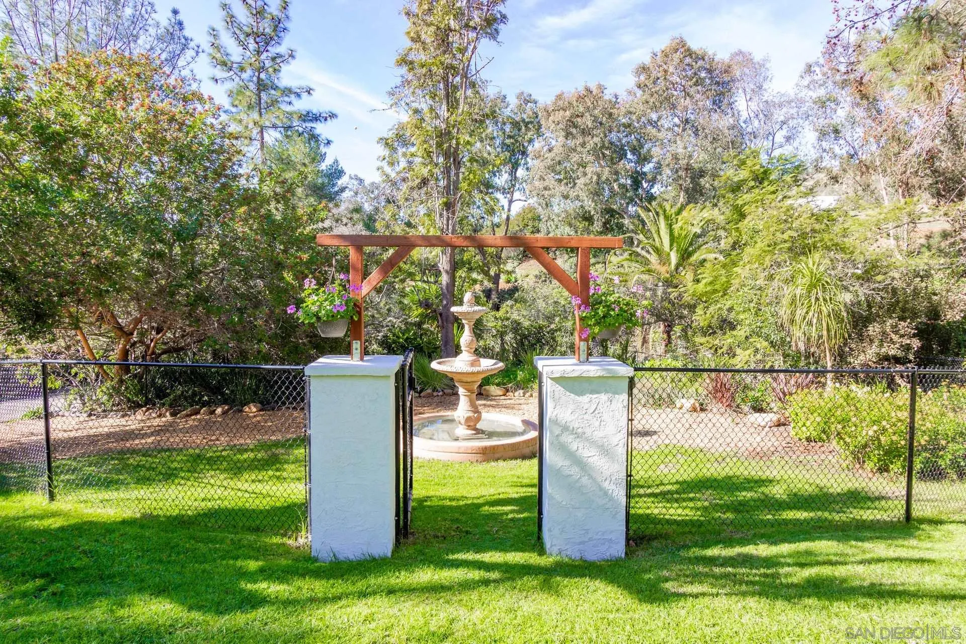 7671 La Brisa Rancho Santa Fe, CA 92067 - Photo 27 of 34 a view of a yard with a slide