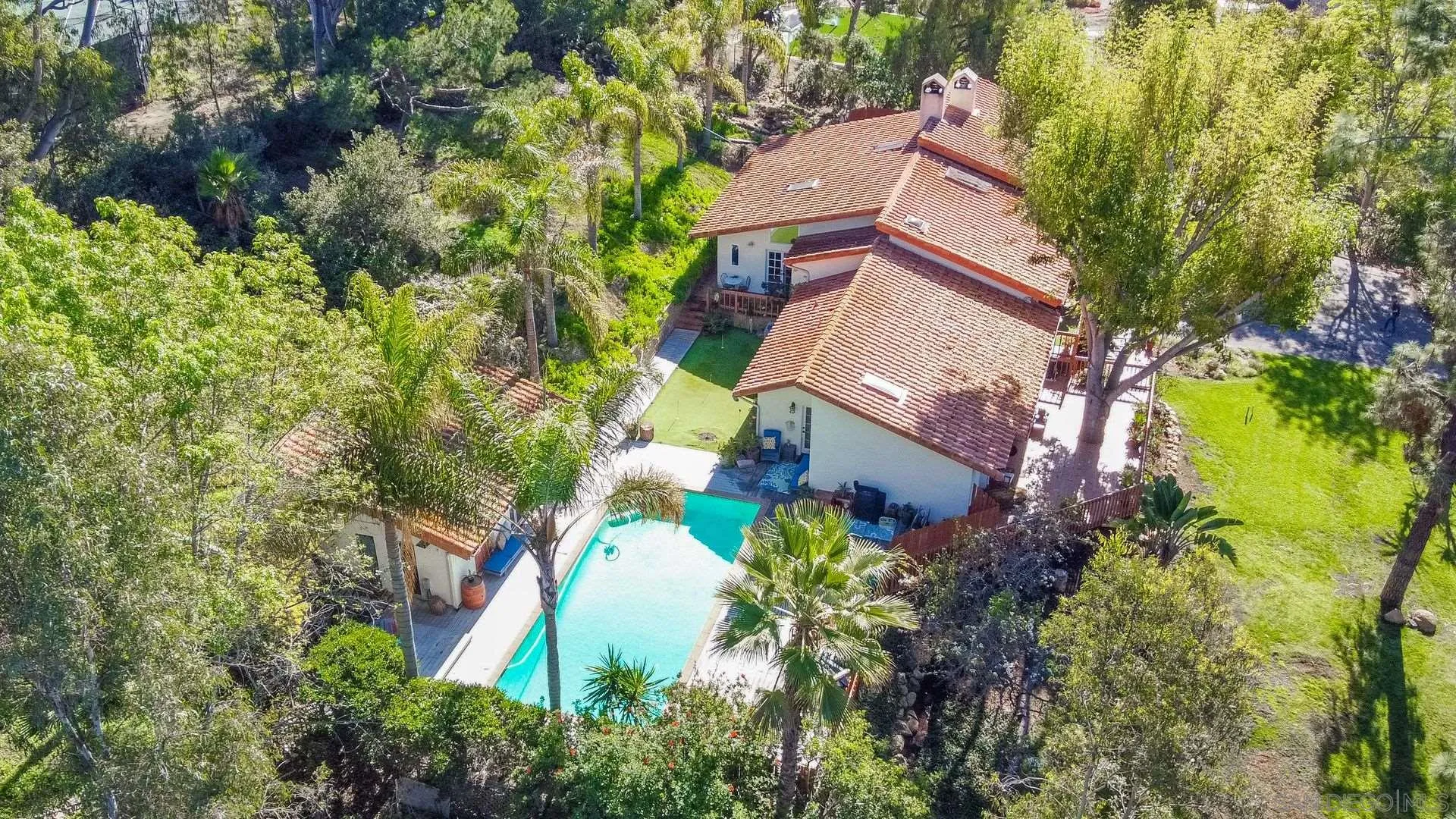 7671 La Brisa Rancho Santa Fe, CA 92067 - Photo 28 of 34 an aerial view of a house with a yard