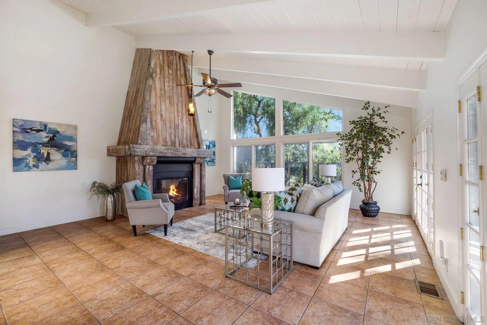 7671 La Brisa Rancho Santa Fe, CA 92067 - Photo 3 of 34 a living room with furniture and a fireplace