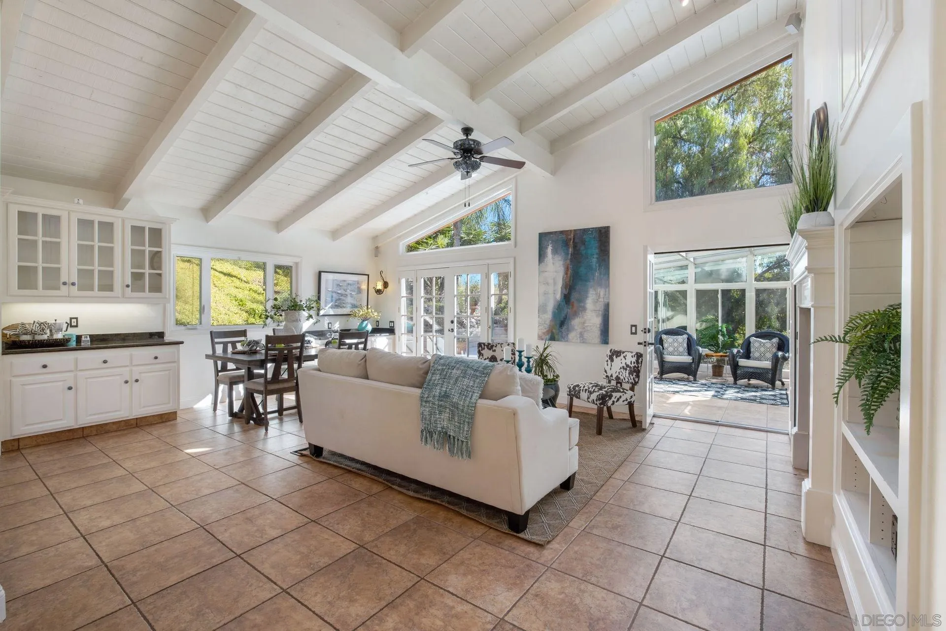 7671 La Brisa Rancho Santa Fe, CA 92067 - Photo 8 of 34 a living room with furniture and a large window