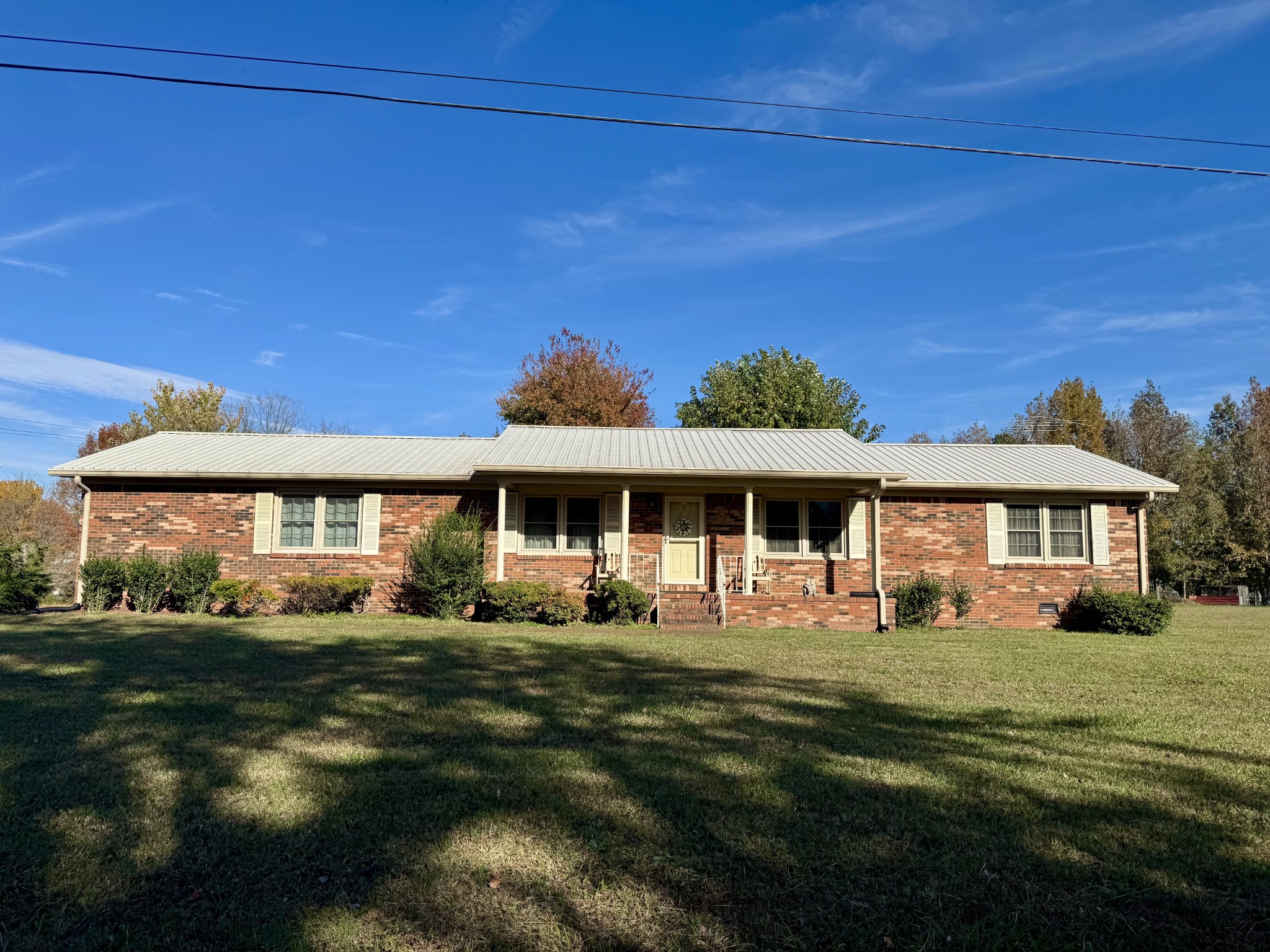 220 Indian Creek Road McEwen, TN 37101 - Photo 1 of 30 a front view of a house with a garden