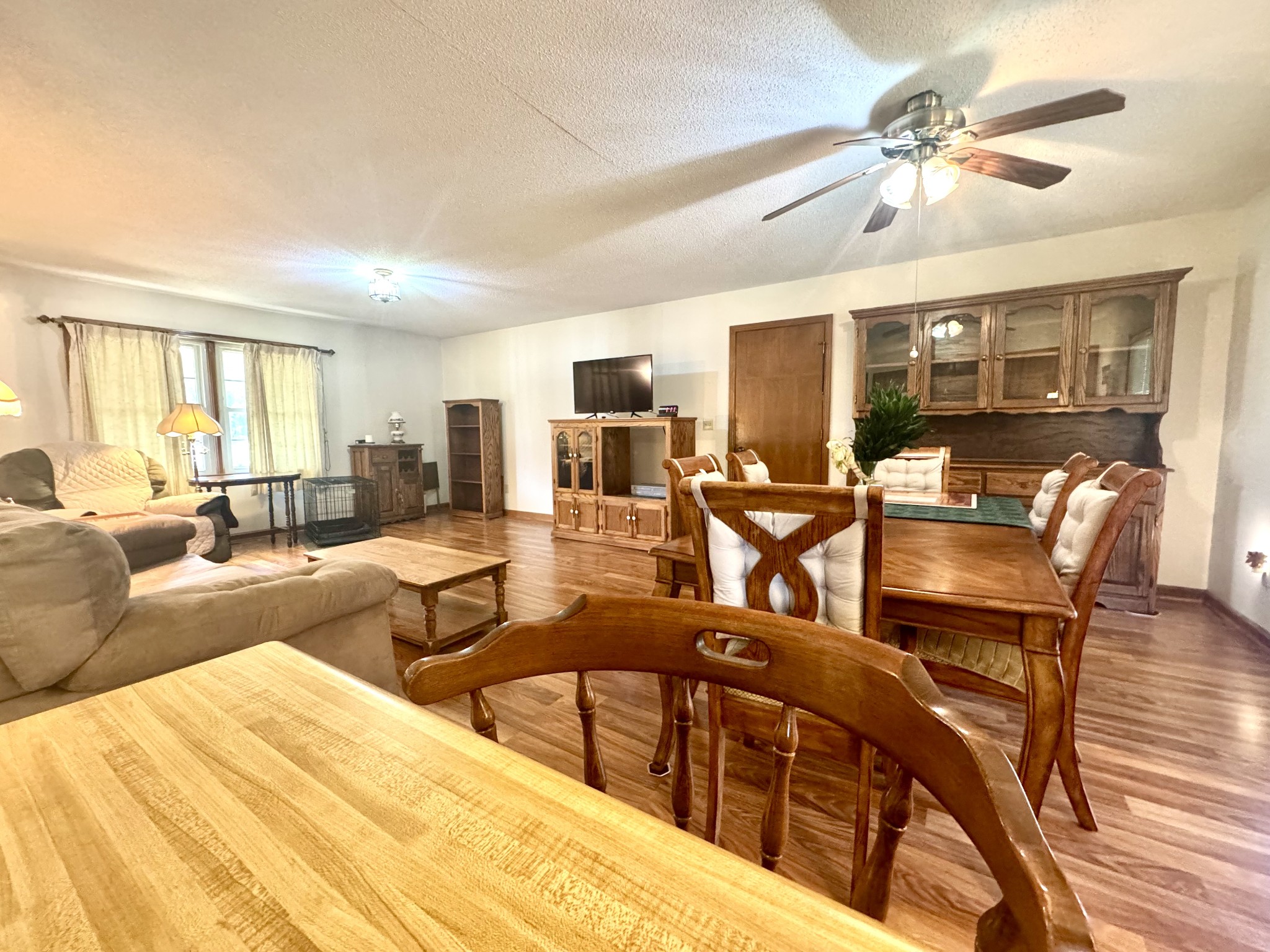 220 Indian Creek Road McEwen, TN 37101 - Photo 16 of 30 a living room with furniture kitchen view and a large window