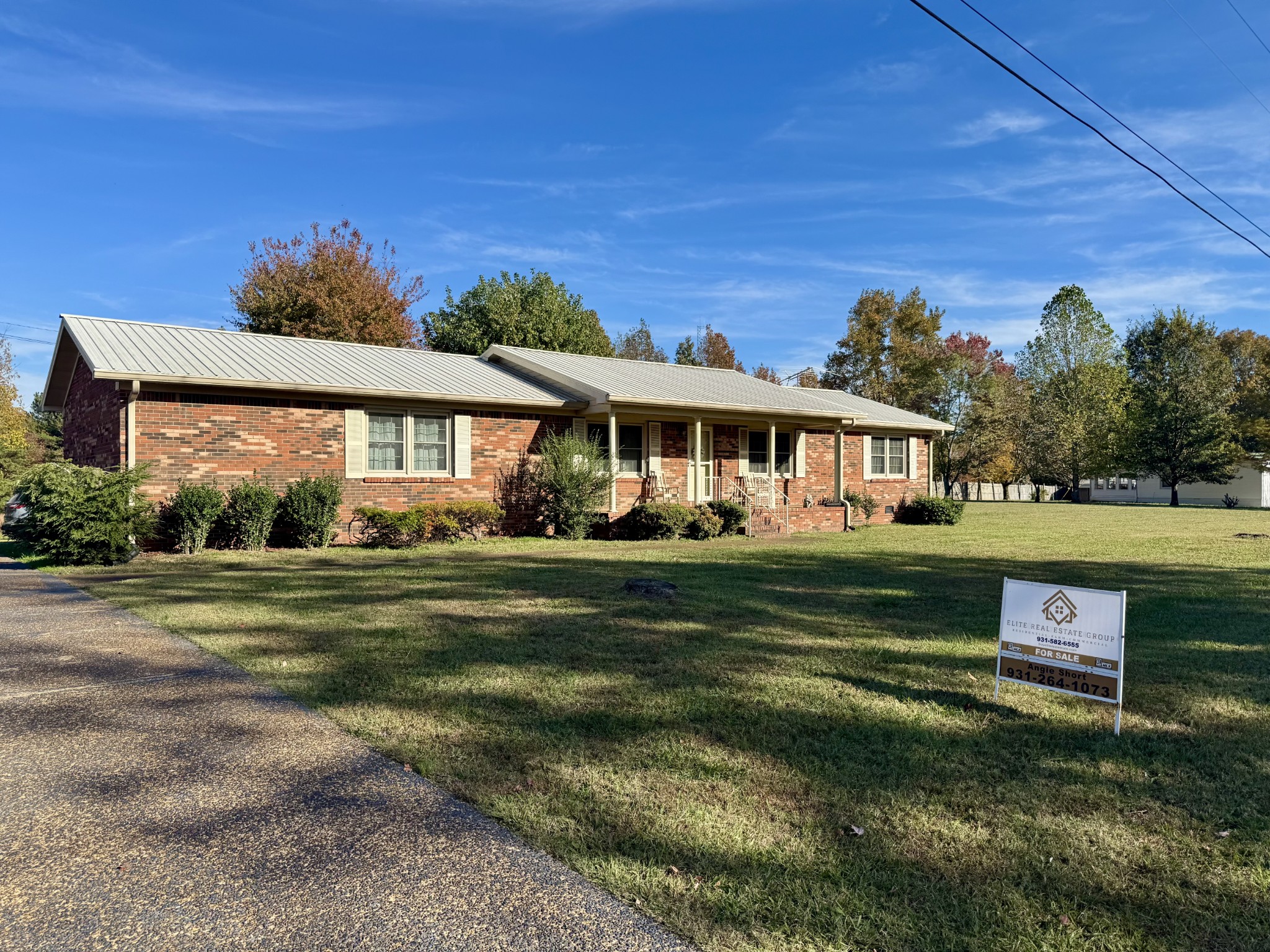 220 Indian Creek Road McEwen, TN 37101 - Photo 2 of 30 a front view of a house with a garden