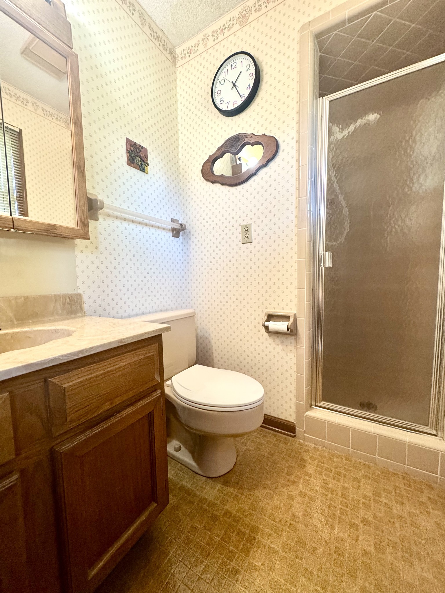 220 Indian Creek Road McEwen, TN 37101 - Photo 22 of 30 a bathroom with a toilet a sink and a shower