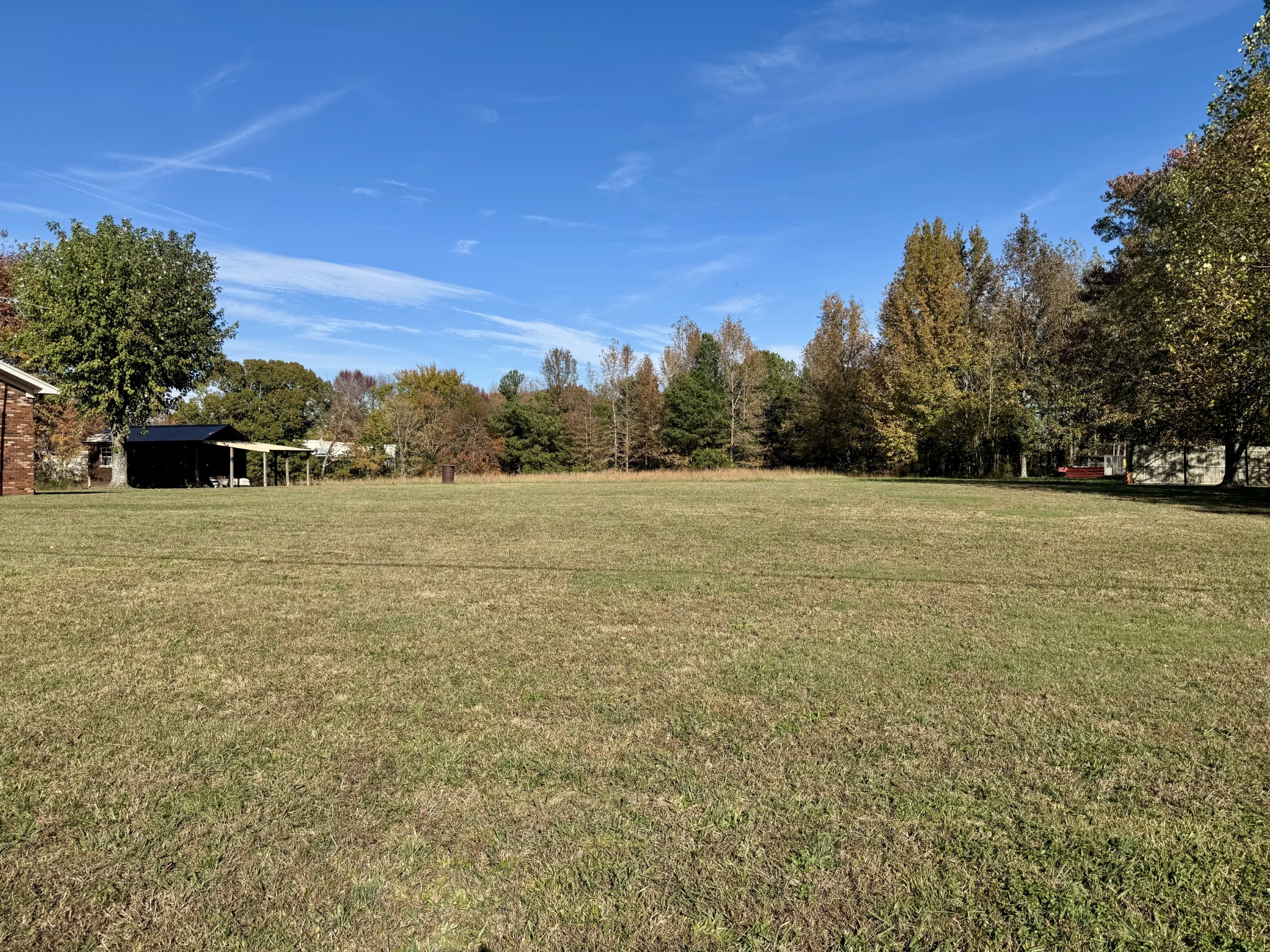 220 Indian Creek Road McEwen, TN 37101 - Photo 4 of 30 a view of a field with trees in the background