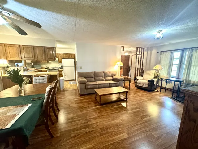 a living room with furniture and a table