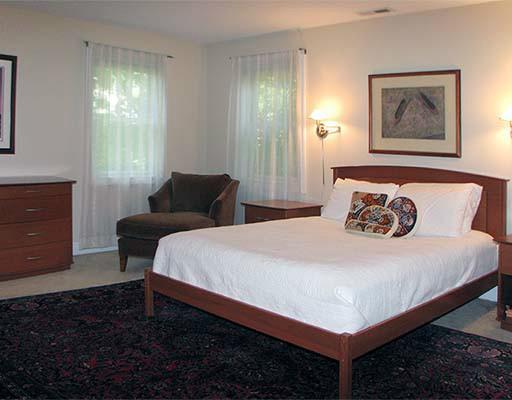 27 Home Place, Unit A Greenwich, CT 06830 - Photo 12 of 17 a bedroom with a bed and window
