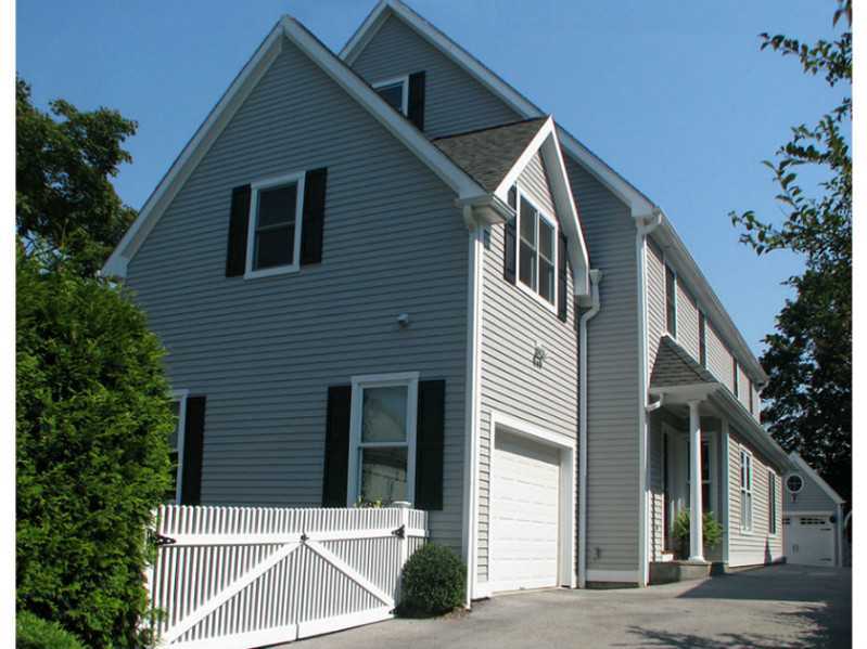 27 Home Place, Unit A Greenwich, CT 06830 - Photo 2 of 17 a front view of a house with plants