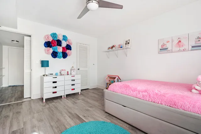 a view of a chairs and table in patio