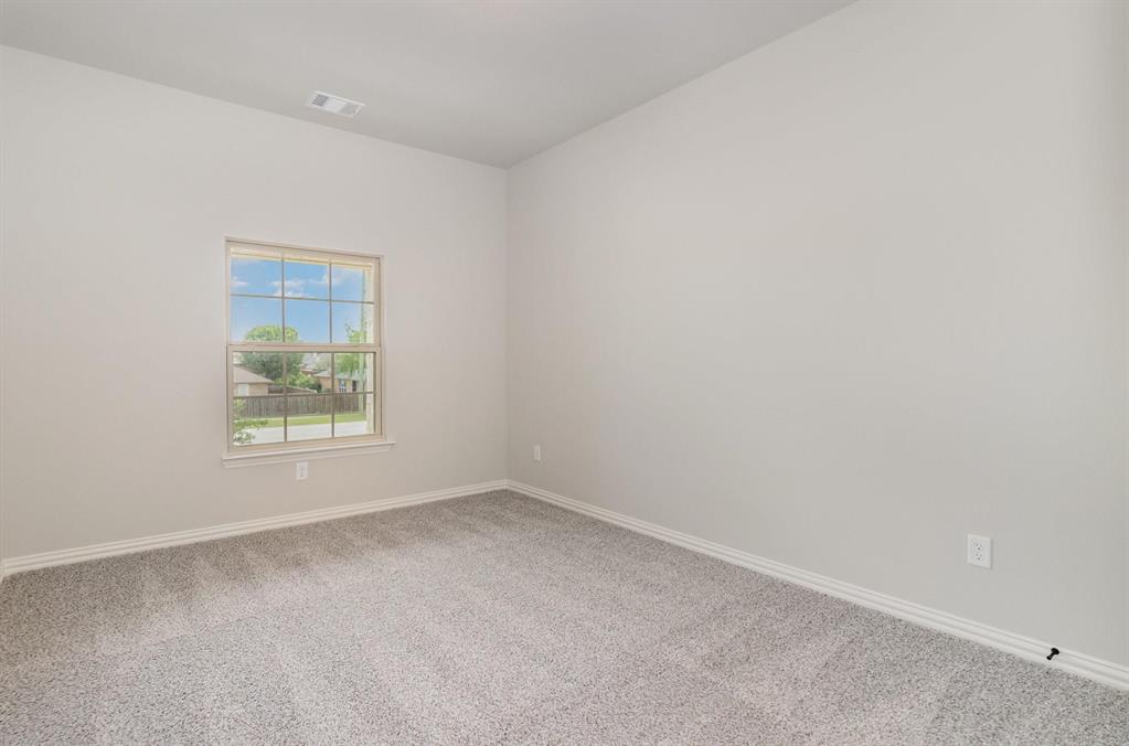 3621 Geoffrey Trail Rowlett, TX 75088 - Photo 4 of 12 an empty room with a window