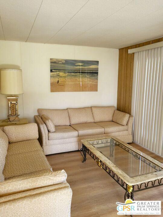 69430 Fairway Road Desert Hot Springs, CA 92241 - Photo 11 of 19 a living room with furniture and a rug