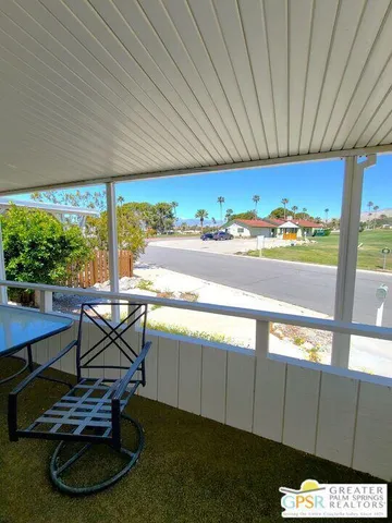 a room with furniture and a window