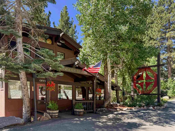 a view of a building with traffic signal lights