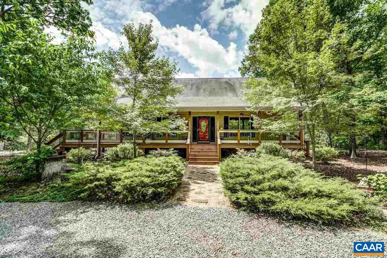 1531 Riding Club Road Keene, VA 22946 - Photo 2 of 27 The driveway circles around the gardens to bring guests to the covered front porch.