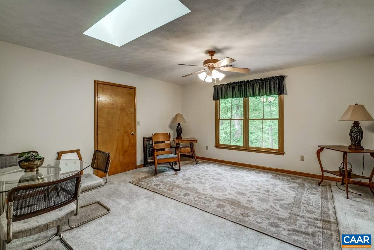 1531 Riding Club Road Keene, VA 22946 - Photo 23 of 27 Note that each of these bedrooms also has a skylight. They are large and pleasant rooms. There is a full bath up here, too.