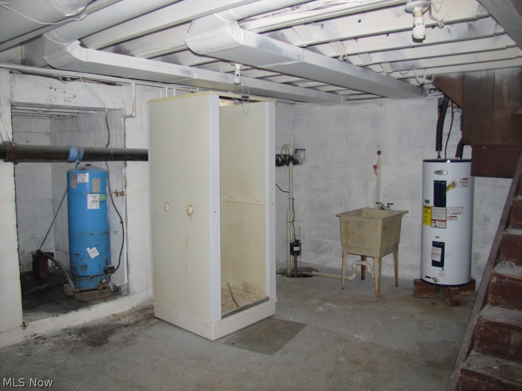 3172 Clinton Road Clinton, OH 44216 - Photo 18 of 19 HWT, pressur tank, sump, shower stall