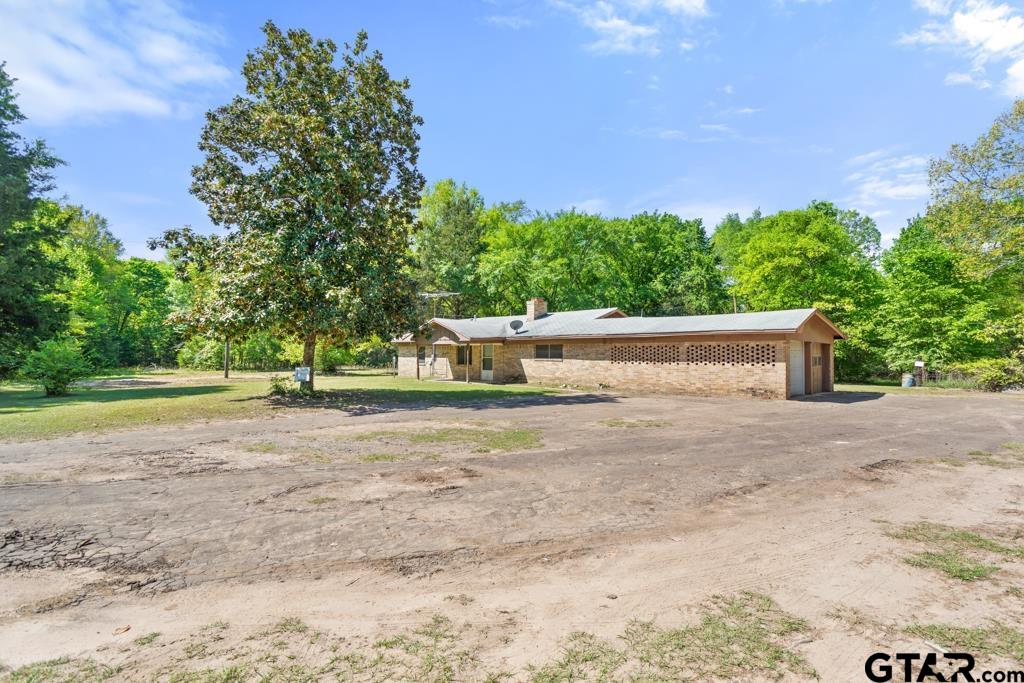 3549 Fm 69 Quitman, TX 75783 - Photo 2 of 32 a view of yard with swimming pool and green space