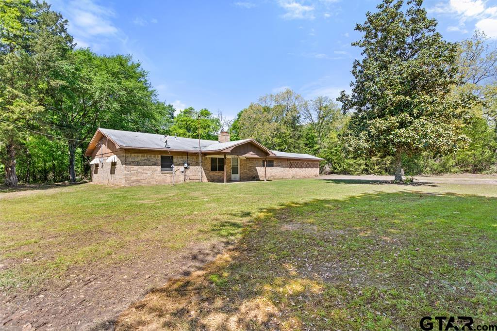 3549 Fm 69 Quitman, TX 75783 - Photo 3 of 32 a front view of house with yard and trees