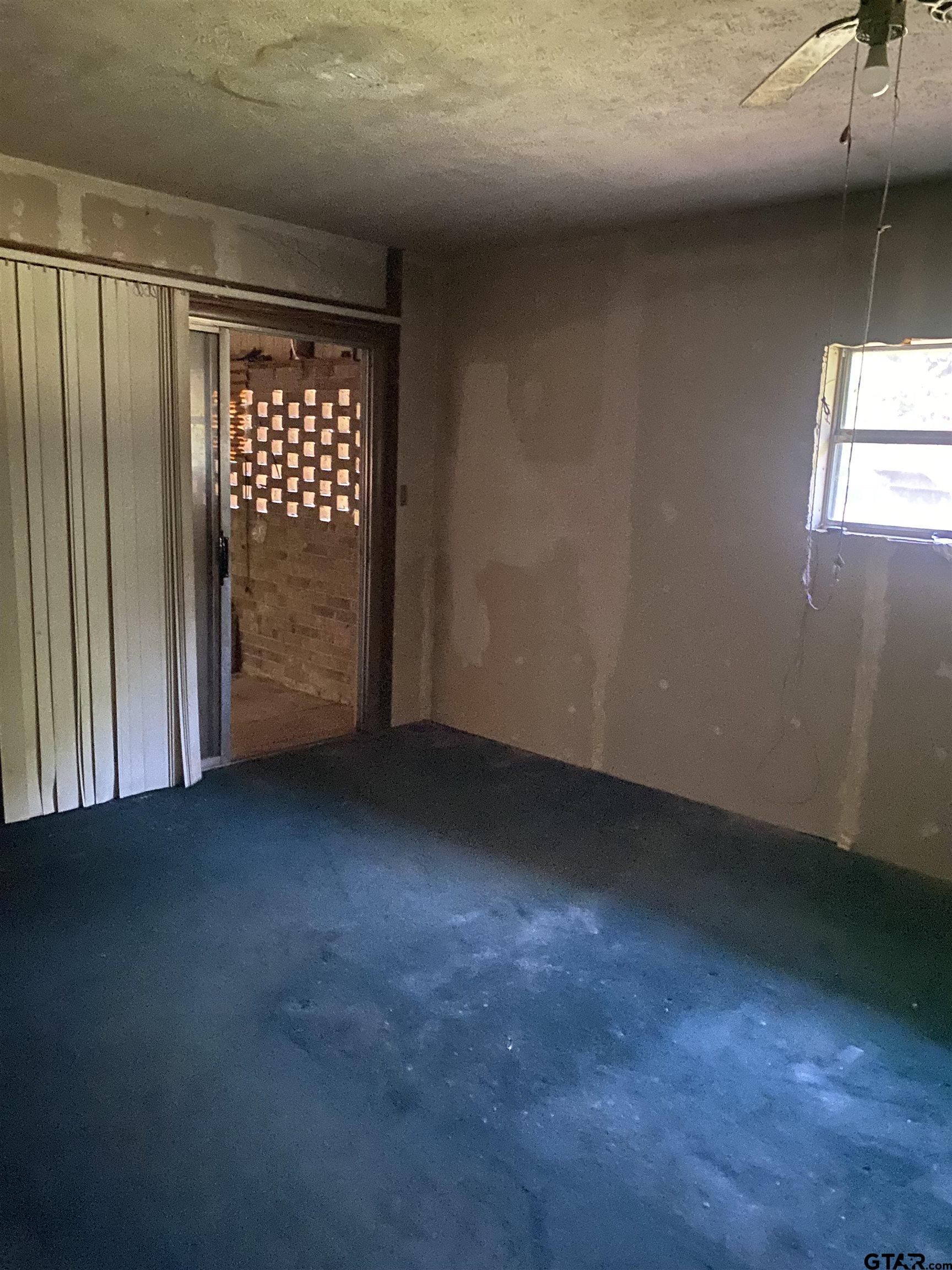 3549 Fm 69 Quitman, TX 75783 - Photo 4 of 32 a view of an empty room with a window