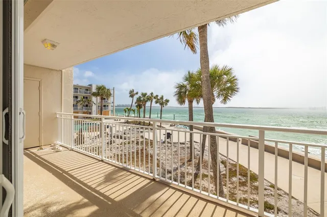 a view of balcony with furniture