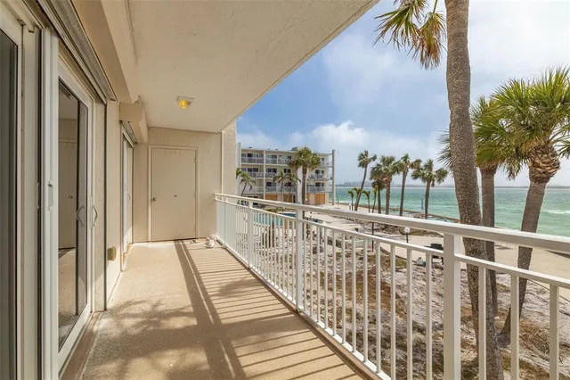 a view of balcony with furniture