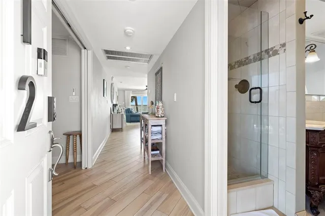 a view of walk in closet with living room