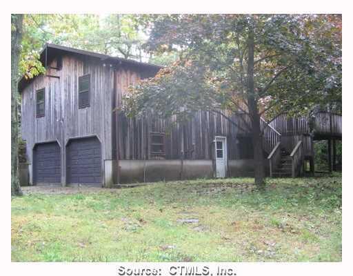 729 Spindle Hill Road Wolcott, CT 06716 - Photo 1 of 1 a backyard of a house with lots of green space