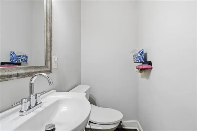 a bathroom with a sink and a toilet