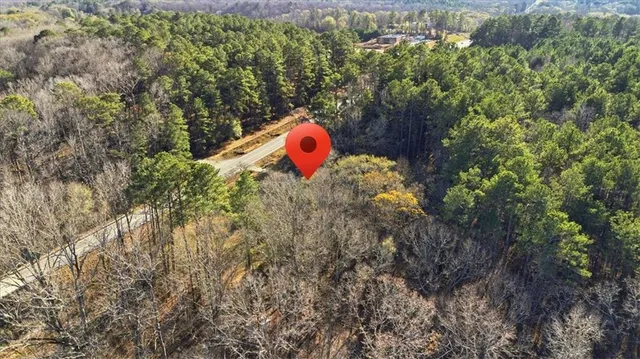 a backyard of a house with a yard and outdoor seating