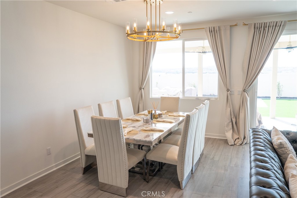 35227 Vernon Drive Beaumont, CA 92223 - Photo 11 of 49 a view of a dining room with furniture window and outside view