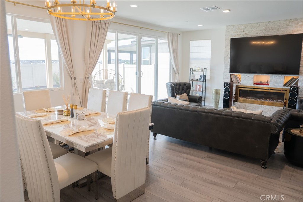 35227 Vernon Drive Beaumont, CA 92223 - Photo 13 of 49 a living room with furniture and a flat screen tv