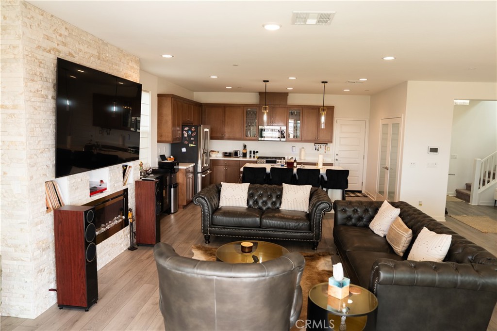 35227 Vernon Drive Beaumont, CA 92223 - Photo 17 of 49 a living room with furniture and a flat screen tv