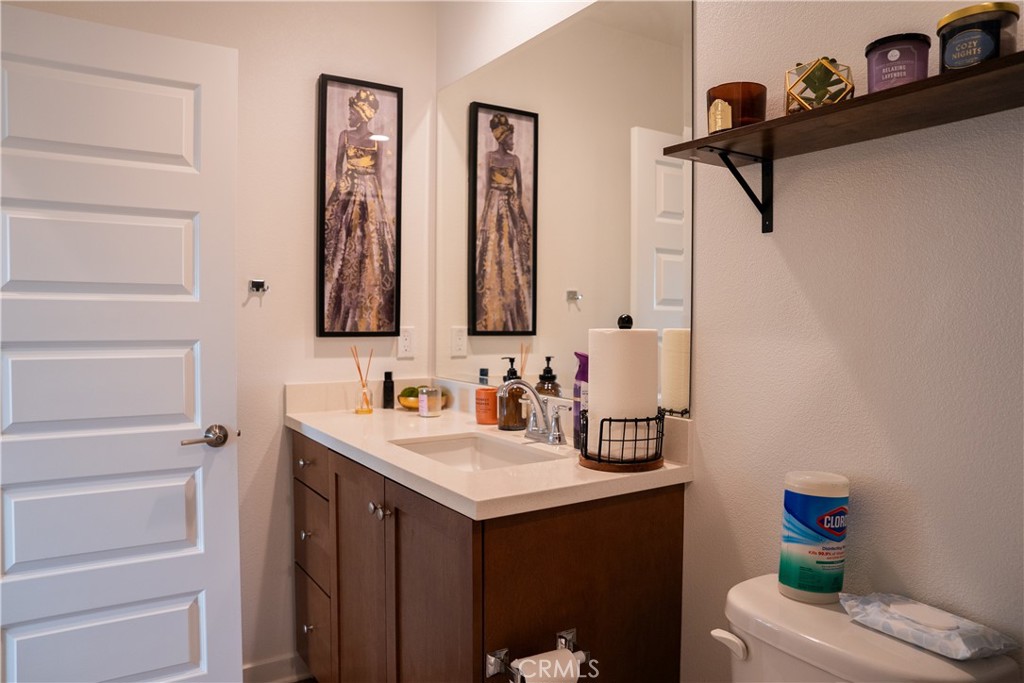 35227 Vernon Drive Beaumont, CA 92223 - Photo 22 of 49 a bathroom with a sink and a mirror