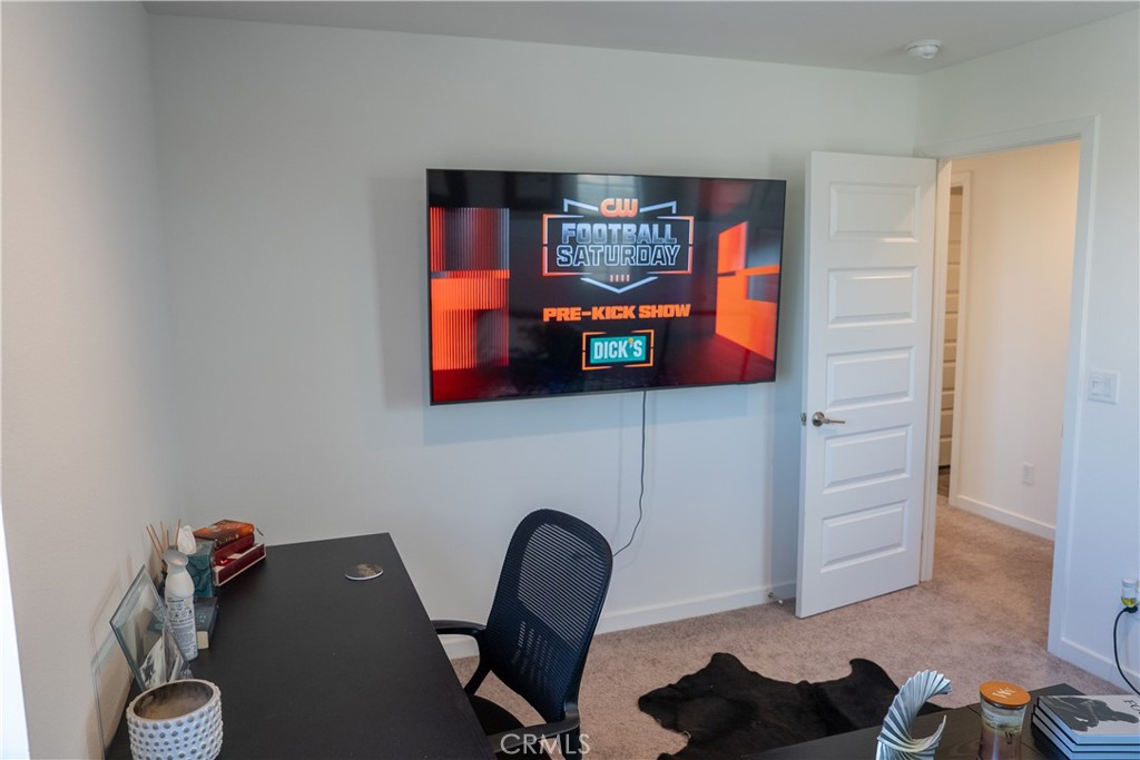 35227 Vernon Drive Beaumont, CA 92223 - Photo 35 of 49 a living room with furniture and a flat screen tv