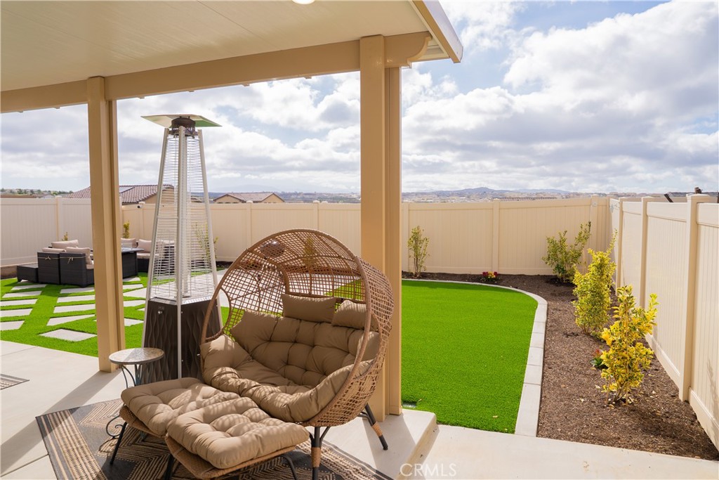 35227 Vernon Drive Beaumont, CA 92223 - Photo 41 of 49 a view of a swimming pool with a patio