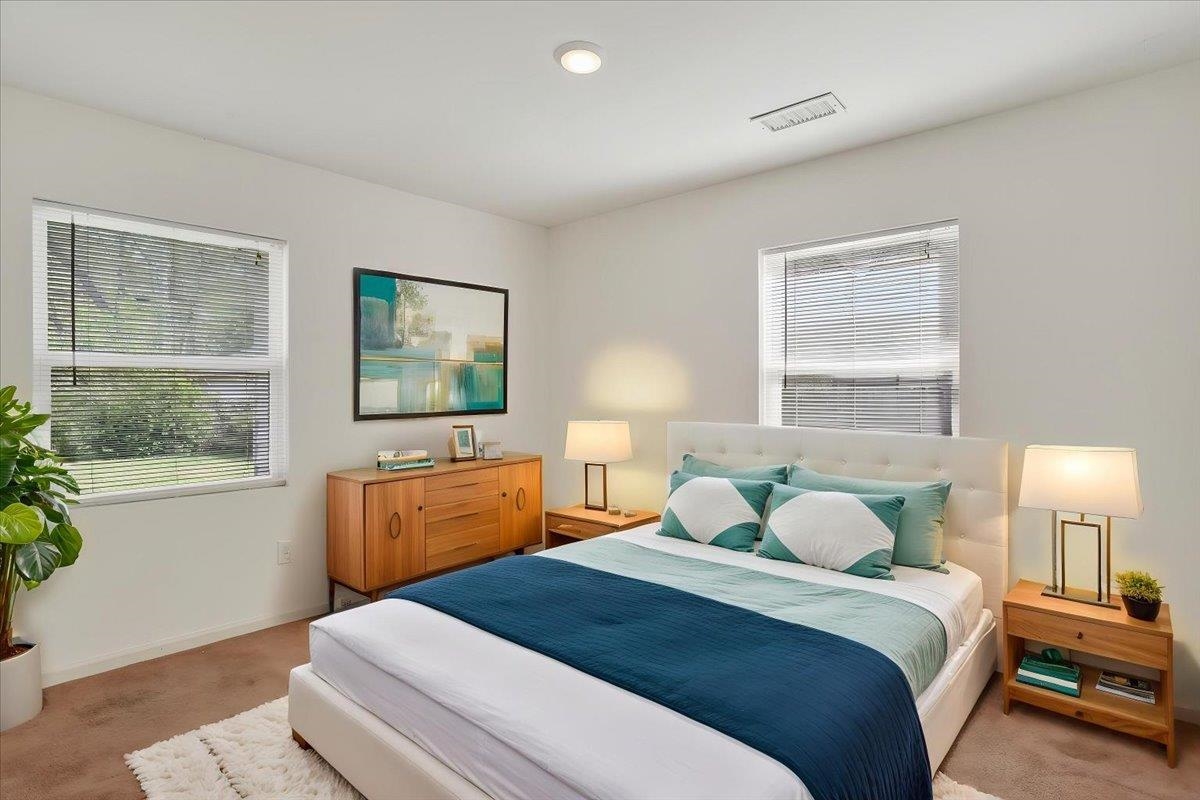 4850 Marcel Avenue Memphis, TN 38122 - Photo 17 of 20 Bedroom with light carpet and baseboards