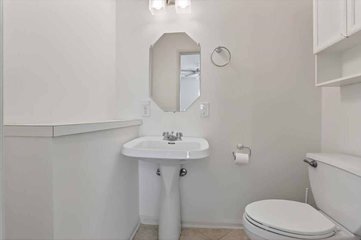 4850 Marcel Avenue Memphis, TN 38122 - Photo 18 of 20 half Bathroom featuring toilet and baseboards